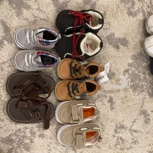 5 pairs Baby boy shoes. 4 pairs never worn. Only one has tags on it.